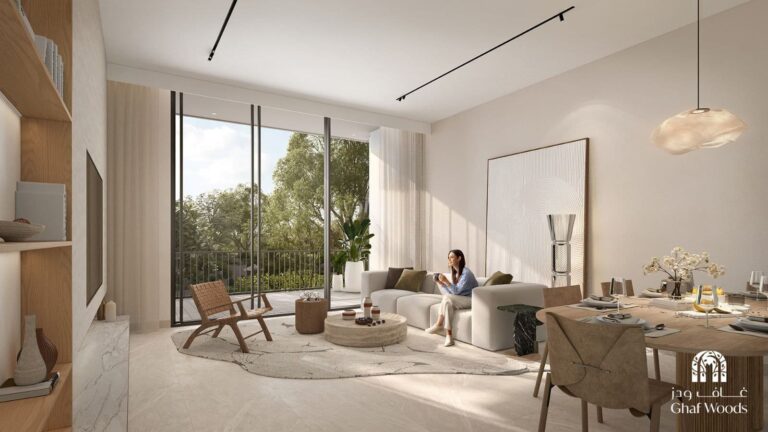Ghaf Woods apartment living and dining room with forest views